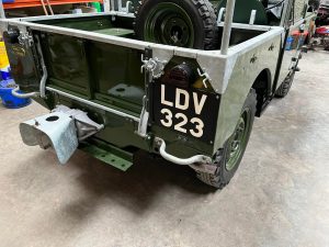 Hand painted show plate on Land-Rover Series One