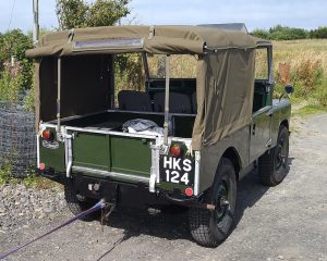 Early Land Rover with hand painted number plate - Rear View