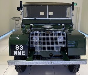 Lovely restored Land Rover with hand painted front number plate