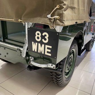 Early Land Rover with hand painted rear number plate